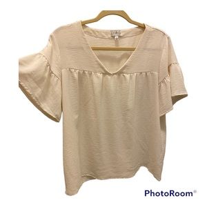 Wonderly, flutter-sleeved, cream-colored blouse. Size L. Like new.